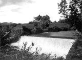 The dam showing concrete addition to the masonry wing, c1930s.